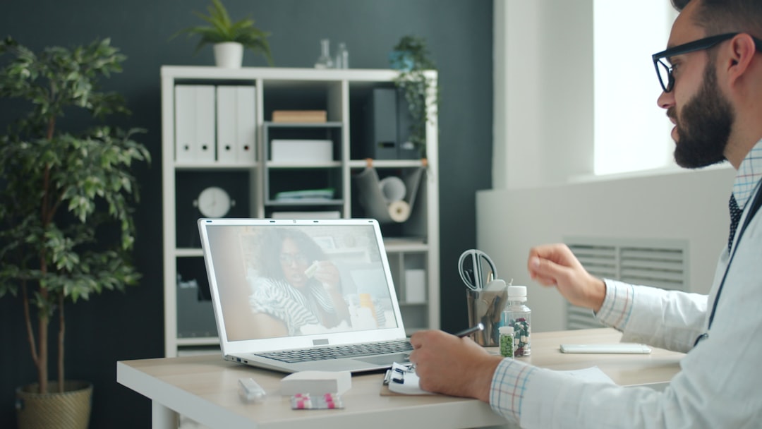 Healthcare professional conducting a telehealth appointment with a patient